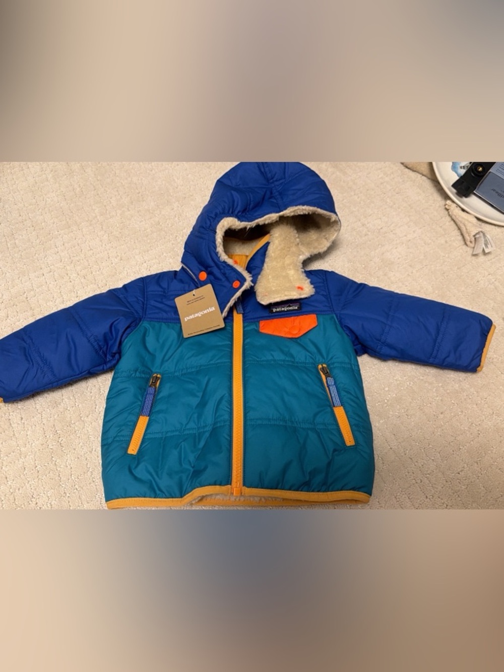 Patagonia Kids Teal and Royal Blue Puffer Jacket with Orange Trim